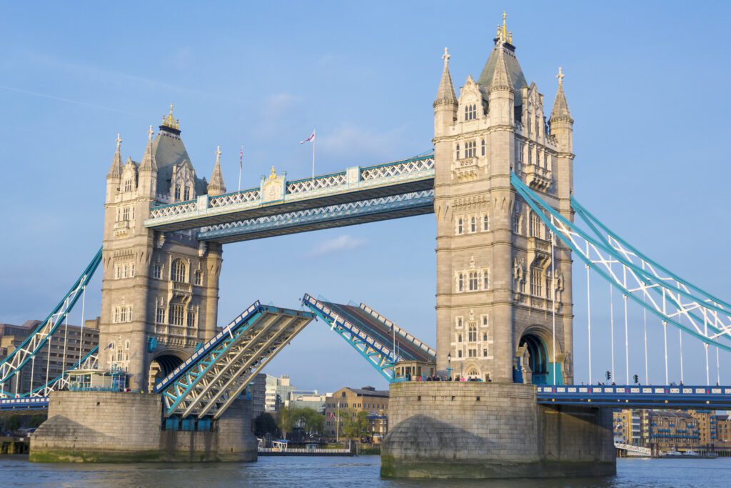 Tower Bridge in London opening over the River Thames