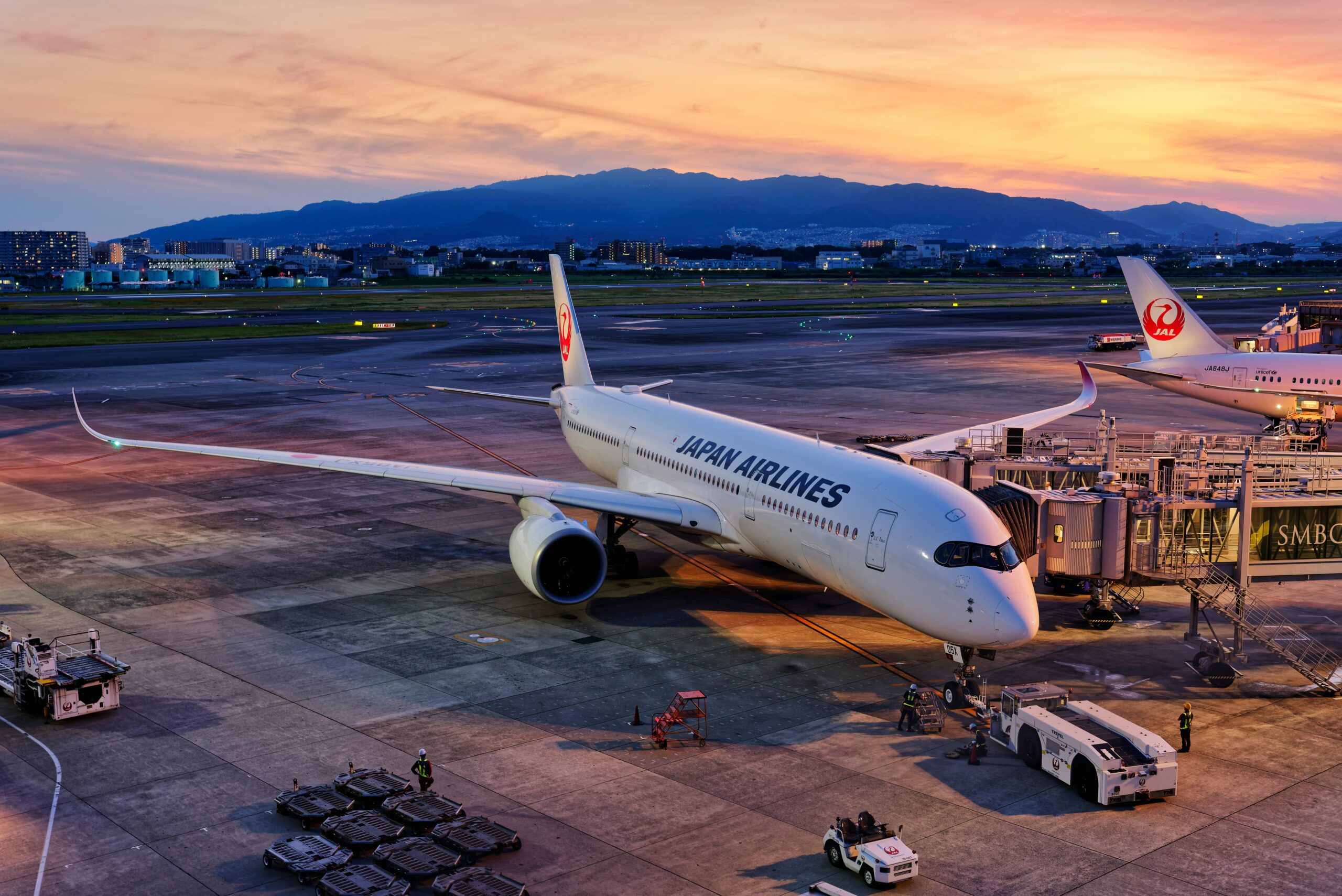 Japan Airlines Airbus A350 at gate during sunset