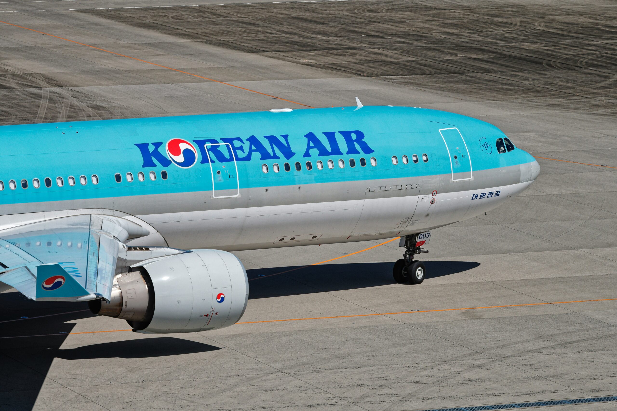 Korean Air Airbus A330 taxiing at airport to landing